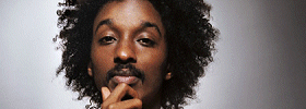 New Hip Hop Star K&prime;naan Says Talking Gangster in Raps is for the Normal 
