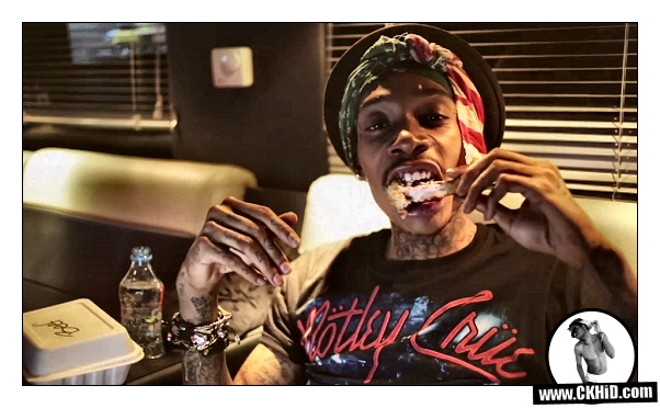 Wiz Khalifa Eats Chicken Wing in Runway Music Video