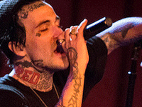 Lil Wayne & Wiz Khalifa Challenged, Yelawolf (@Yelawolf) Gets Slumerican Face Tattoo
