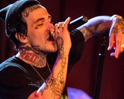 Lil Wayne & Wiz Khalifa Challenged, Yelawolf (@Yelawolf) Gets Slumerican Face Tattoo